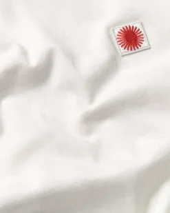 Camiseta blanca sol espalda rojo Aaron