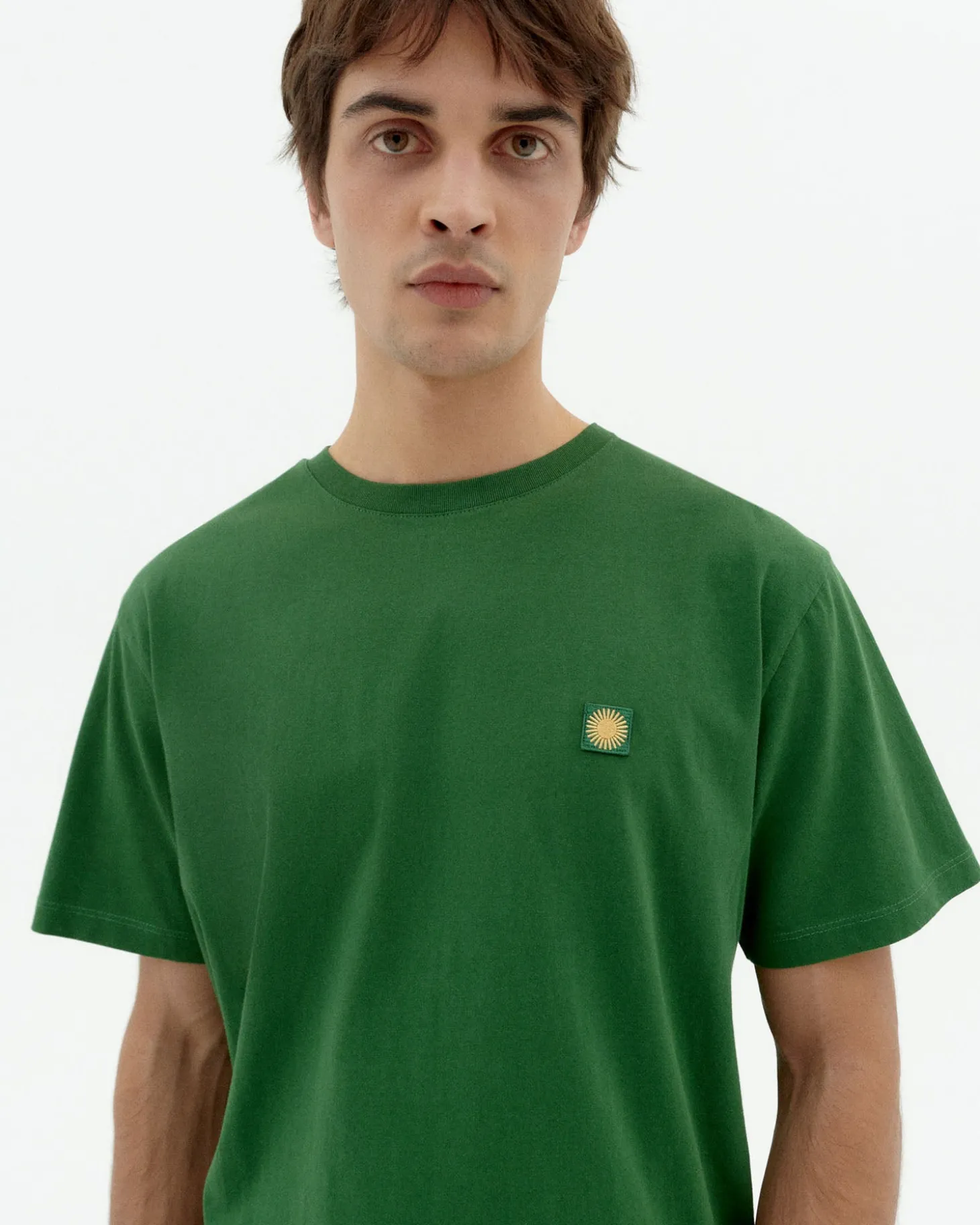 Camiseta verde sol espalda amarillo